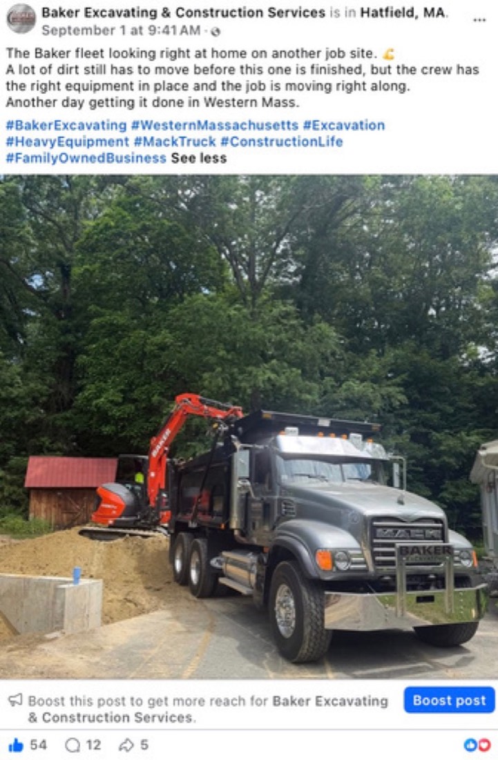 Baker Excavating and Construction Services post by Logan Graves, equipment loading a truck on a job site