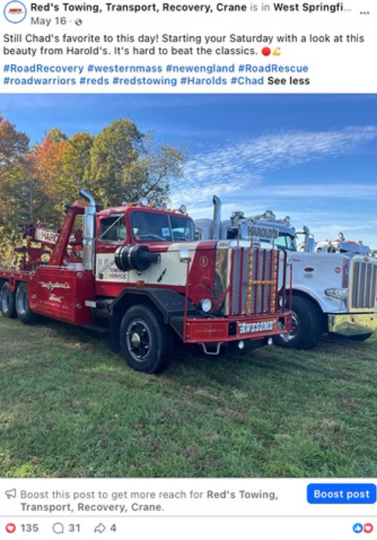 Red's Towing post by Logan Graves, a tow truck on a job